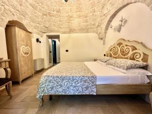 Łóżko lub łóżka w pokoju w obiekcie Savito Guest House