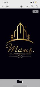 Mans lux 8 Apartman في زلاتيبور: شعار مطبخ فيلاارما مع مبنى