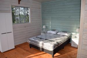 Ένα ή περισσότερα κρεβάτια σε δωμάτιο στο Casa Marea Brava