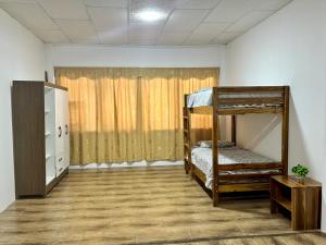 Postel nebo postele na pokoji v ubytování ROOM AYAMPE - La Casa de Eros