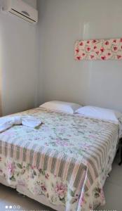 A bed or beds in a room at Casa de ferias paraíso