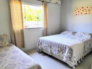 A bed or beds in a room at Casa de ferias paraíso