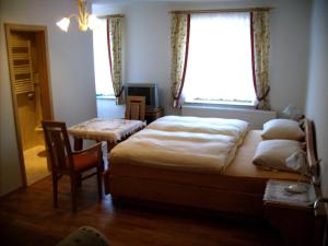 Postel nebo postele na pokoji v ubytování Gästehaus Bader