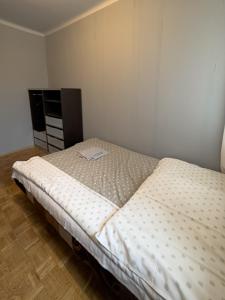 Posteľ alebo postele v izbe v ubytovaní Kwadrat B&B Jałowego