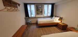 Voodi või voodid majutusasutuse The Aarburg Hotel & Café toas