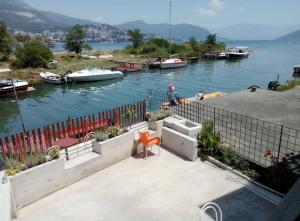a view of a marina with boats in the water at Apartment Željka, Igalo - Herceg Novi in Igalo