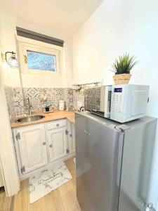 Køkken eller tekøkken på Nido Alpino Sestriere + 12 billeder