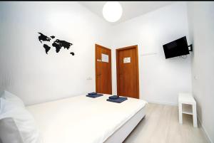 Posteľ alebo postele v izbe v ubytovaní Atlas Hotel