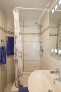Koupelna v ubytování Hotel Garni Demmel