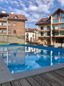 Bazén v ubytování GVC New Gudauri Apartments Loft nebo v jeho okolí