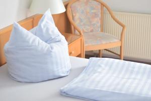 Postel nebo postele na pokoji v ubytování Niebuhrs Hotel