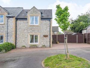 a house with a tree in front of it at 1 Bed in Bakewell 88085 in Bakewell