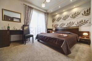 Кровать или кровати в номере Hotel Orlik