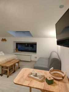 TV a/nebo společenská místnost v ubytování Di Finizio_Cottage