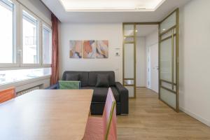 Area soggiorno di GRAN VIA capitals by MONARO*****
