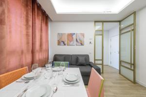 Area soggiorno di GRAN VIA capitals by MONARO*****