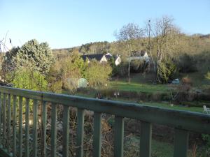 a view from the balcony of a house at Les Buissonnets in Giverny