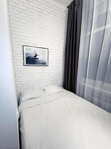 Posteľ alebo postele v izbe v ubytovaní Atlas Hotel