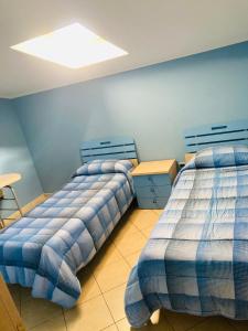 Ένα ή περισσότερα κρεβάτια σε δωμάτιο στο Kiss From Catania +32 φωτογραφίες