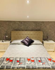 Ένα ή περισσότερα κρεβάτια σε δωμάτιο στο Kiss From Catania