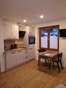 Una cocina o kitchenette en Haus Grugger Appartements