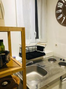 Kuchyňa alebo kuchynka v ubytovaní Habitation CASSIOPEE