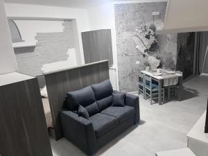 A seating area at Nina's house 3 , a 300 metri dal mare