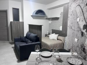 A seating area at Nina's house 3 , a 300 metri dal mare