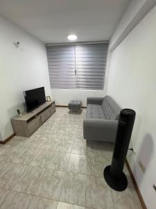 TV a/nebo společenská místnost v ubytování Apartamento Diagonal a Hesperia y Dunas