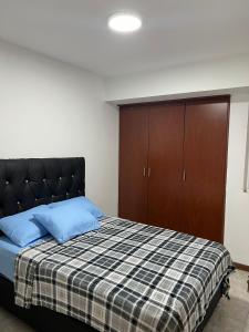 Postel nebo postele na pokoji v ubytování Apartamento Diagonal a Hesperia y Dunas