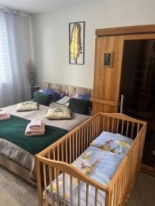 Posteľ alebo postele v izbe v ubytovaní BEE happy