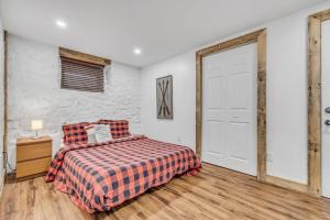 מיטה או מיטות בחדר ב-Initial / Repere / Chutes-Montmorency