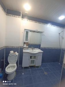 Salle de bains dans l'établissement Аренда уютной квартиры