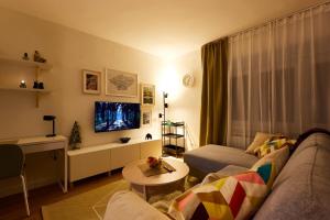 Et opholdsområde på Apartman Maksimir + 24 billeder