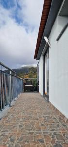 a balcony with a view of a mountain at Madeira Mountain Paradise - Casa da Levada do Arco in Arco da Calheta