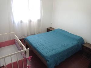 Ένα ή περισσότερα κρεβάτια σε δωμάτιο στο A 7 cuadras de centro y 2 de río