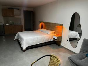 A bed or beds in a room at Hospedajes Silk Road