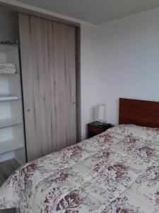 Postel nebo postele na pokoji v ubytování Lindo y acogedor departamento.