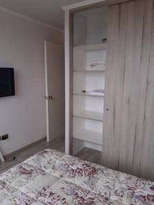 Postel nebo postele na pokoji v ubytování Lindo y acogedor departamento.