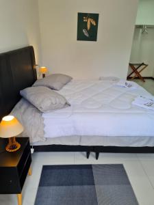 Giường trong phòng chung tại Estalagem Floradas da Serra