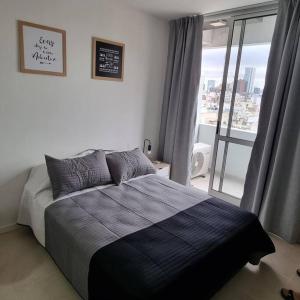 Ένα ή περισσότερα κρεβάτια σε δωμάτιο στο El arte suites