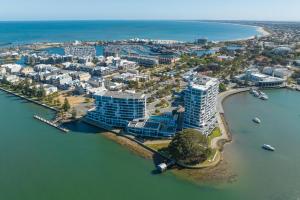 an aerial view of a city with buildings and the water at Bayview 705 in Mandurah