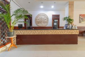 Lobby o reception area sa Puri Mango Guest House Sanur