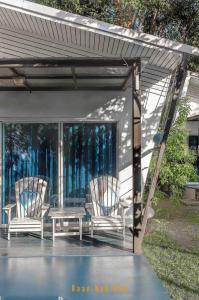 Aed väljaspool majutusasutust Baan Koh Mak