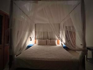 เตียงในห้องที่ Las Terrenas - Caribbean Villa for 6 people - Exceptional location