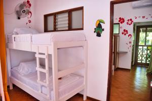 Postel nebo postele na pokoji v ubytování Samara Pacific Lodge