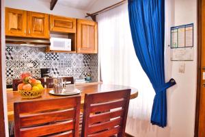 Kuchyň nebo kuchyňský kout v ubytování Samara Pacific Lodge