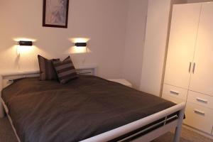 En eller flere senge i et værelse på Ferienwohnung Arlt