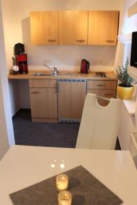Køkken eller tekøkken på Ferienwohnung Arlt