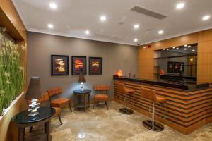 a bar in a restaurant with chairs and tables at Ferman Hilal Hotel-Special Category in Istanbul